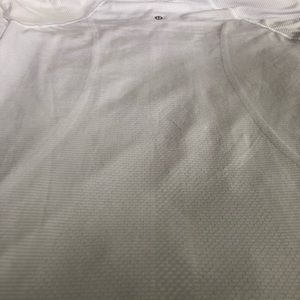 Lululemon white swiftly tech, regular length, color is white, size 8